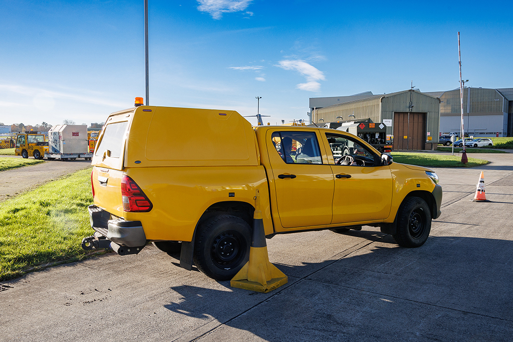 Photo: Airfield utility vehicle manoeuvring around obstructions.